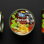 Абрикоси половинками у сиропі KIER, кришка консервної банки, вигляд зверху