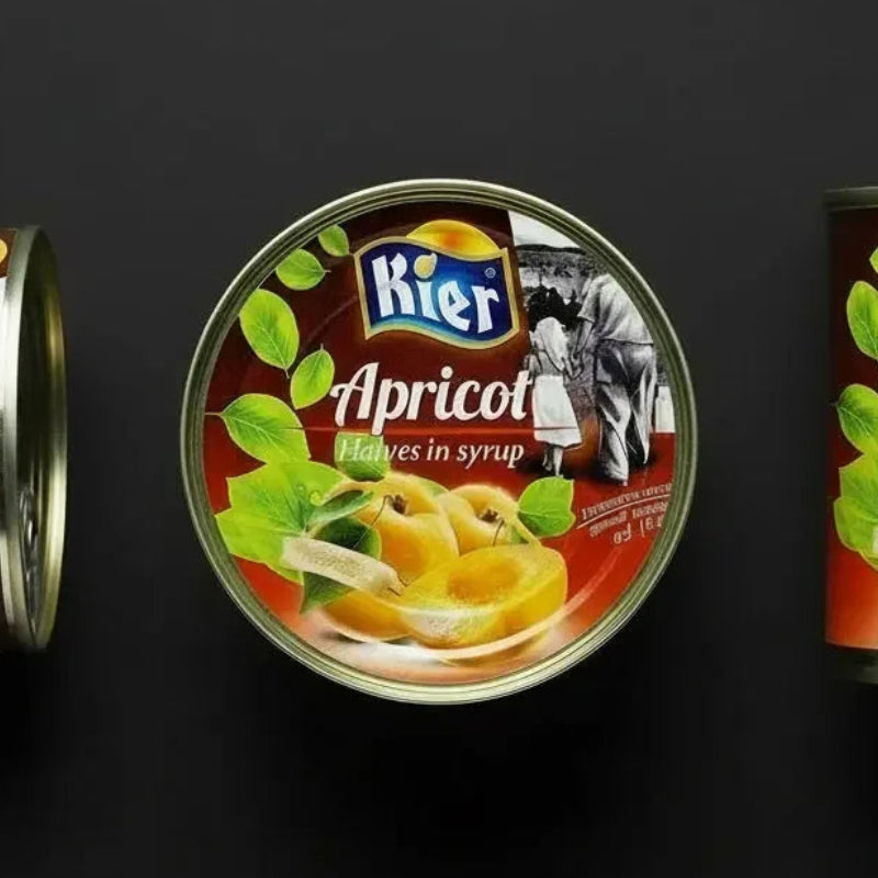 Абрикоси половинками у сиропі KIER, кришка консервної банки, вигляд зверху